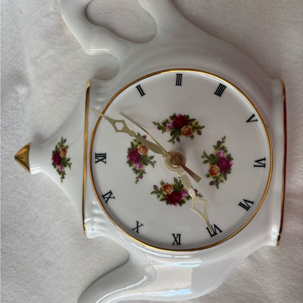 Floral Teapot Wall Clock with Gold Accents